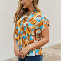 And The Why Full Size Printed Ruffle Baby Doll Top